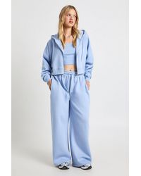 Boohoo - Petite Deep Hem Crop Top 3 Piece Hooded Tracksuit - Lyst
