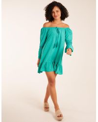 green emerald velvet dress Bardot dress with bottle bow effect