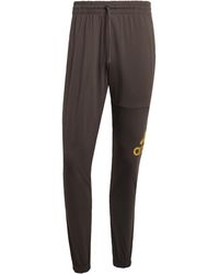 adidas - Essentials Single Jersey Tapered Badge Of Sport Pants - Lyst