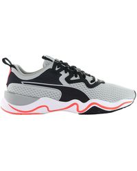 PUMA - Zone Xt High Rise Lava Blast Trainers - Lyst