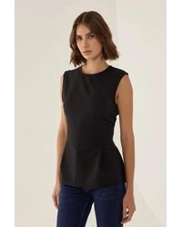 Hiccup - Zwarte Peplum Top - Lyst