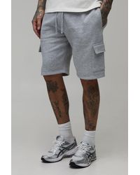 BoohooMAN - Tall Loose Fit Mid Length Cargo Shorts - Lyst