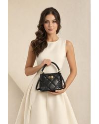 SVNX - Quilted Top-Handle Crossbody Mini Handbag - Lyst