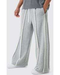 BoohooMAN - Extreme Wide Leg Exposed Seam Jogger - Lyst