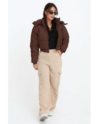 Femme Luxe - Cropped Padded Long Sleeve Zip Front Shower Proof Jacket - Lyst