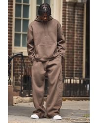 BoohooMAN - Oversized Boxy Worldwide Debossed Wide Leg Tracksuit - Lyst