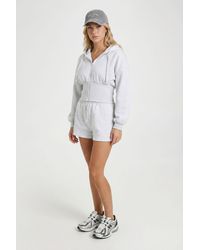 Boohoo - Cinched Waist Zip Through Cropped Hooded Short Tracksuit - Lyst