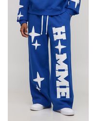 BoohooMAN - Wide Leg Homme Star Applique Joggers - Lyst