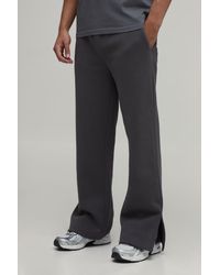 BoohooMAN - Baggy Flared Fit Split Hem Joggers - Lyst