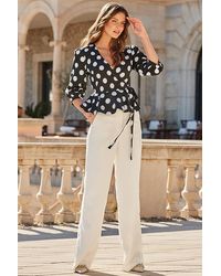 Sosandar - Spot Print Peplum Hem Wrap Top Denim - Lyst