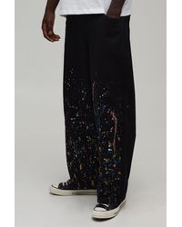 BoohooMAN - Barrel Leg Curve Seam Paint Splatter Trousers - Lyst