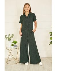 Yumi' - Ditsy Floral Print Relaxed Wide Leg Trousers - Lyst