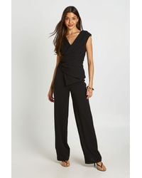 Boohoo - Wrap Front Drape Detail Wide Leg Jumpsuit - Lyst