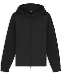 BOSS - Solid Patterned Hooded Ribbed Cuff Rain Jacket With Logo Badge - Lyst