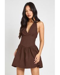Boohoo - Petite Cotton Poplin Halter Neck Pleated Mini Dress - Lyst