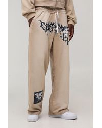 BoohooMAN - Wide Leg Patch Applique Cross Washed Jogger - Lyst