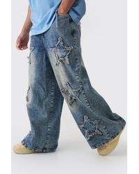 BoohooMAN - Wide Leg Rigid Star Distressed Applique Jeans - Lyst