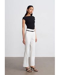 Dilvin - High-Waist Striped Flare Trousers With Belt - Lyst