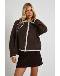 Boohoo - Chunky Boucle Knit Contrast Trim Button Through Cardigan - Lyst