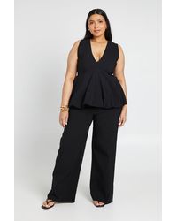 Boohoo - Plus Bengaline Plunge V Neck Peplum Top & Wide Leg Trouser Co Ord - Lyst