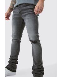 BoohooMAN - Skinny Stacked Flared Jeans With Knee Rip - Lyst