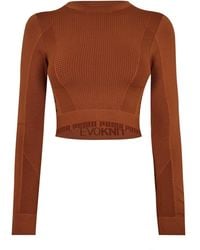 PUMA - Evoknit Seamless Long Sleeve Crop Top - Lyst