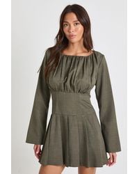 Boohoo - Ruched Bust Long Sleeve Pleated Skater Dress - Lyst