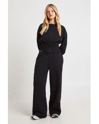 Boohoo - Petite Cinched Waist Button Through Sweatshirt Tracksuit - Lyst