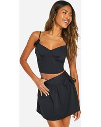 Boohoo - Ruched Bow Mini Skirt - Lyst
