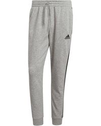 adidas - Essentials Tapered Cuff 3-Stripes Joggers - Lyst