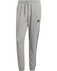 adidas - Essentials Tapered Cuff 3-Stripes Joggers - Lyst