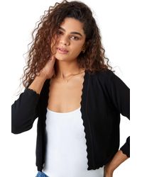 Roman - Scalloped Edge Stretch Knit Shrug - Lyst