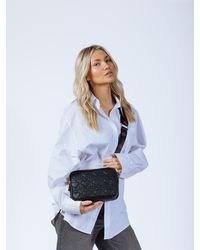 SVNX - Heart Quilted Crossbody Camera Bag - Lyst