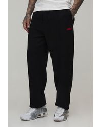 BoohooMAN - Tall Regular Fit Exposed Seam Embroidered Cuffed Jogger - Lyst