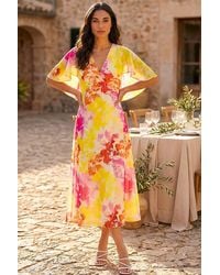 Roman - Abstract Printed Cape Dress - Lyst