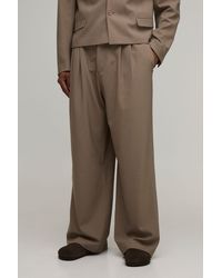 BoohooMAN - Tailored Pleat Front Wide Fit Suit Trousers - Lyst