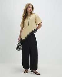 River Island - T-Shirt Asymmetric Lace Satin - Lyst