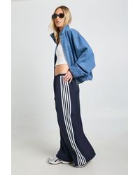 Boohoo - Petite Nylon Side Stripe Wide Leg Trousers - Lyst