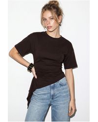 Bianco Lucci - Fitted Jersey Blouse With Drape Detail - Lyst