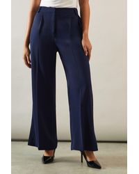 Wallis - Petite Belt Detail Side Split Flare Trousers - Lyst