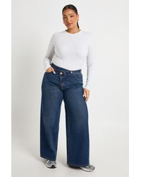Boohoo - Plus High Waist Crossover Waistband Wide Leg Jean - Lyst