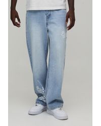 BoohooMAN - Relaxed Fit Floral Puff Print Jeans - Lyst