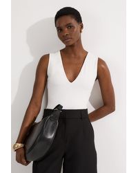 Karen Millen - Stretch Cotton Plunge Neck Jersey Bodysuit - Lyst