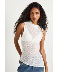 Boohoo - Lace Grown On Neck Asym Hem Top - Lyst