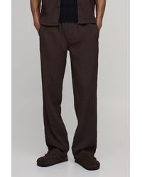 BoohooMAN - Relaxed Fit Irregular Pleat Texture Trousers - Lyst