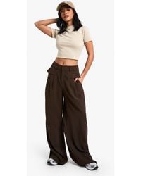 Boohoo - Petite Fluid Belted Wide Leg Trousers - Lyst