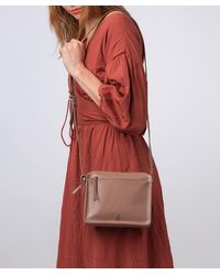 Conkca - 'Aurora' Natural Leather Cross Body Bag - Lyst