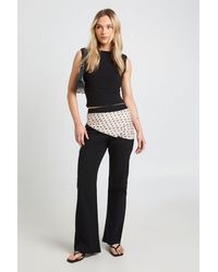 Boohoo - Petite Stretch High Waisted Flared Trousers - Lyst