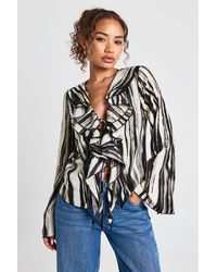Boohoo - Zebra Chiffon Plunge Tie Front Blouse - Lyst
