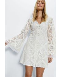Warehouse - Lace Covered Button Flared Sleeve Mini Dress - Lyst